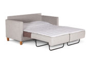 In picture: Nicole 2 opened into bed position. Fabric: Linea 16. Leg: 1, oak.