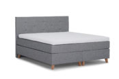 In picture: Continental Seili with Seili headboard and SuperMega topmattress. Fabric: Amanda 12. Leg: 51, oak.